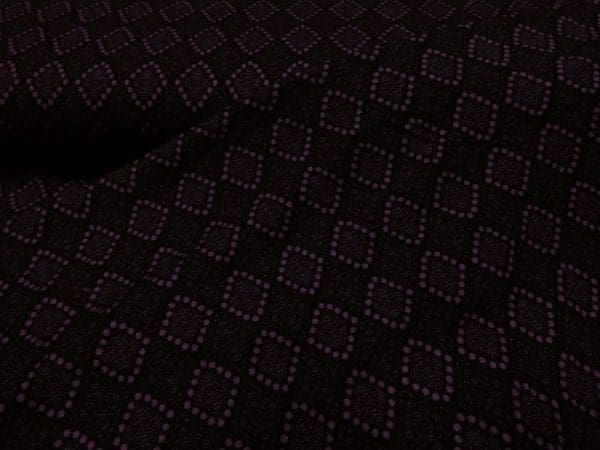 bedrukte tricot salmiak aubergine