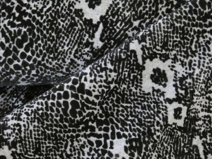 tricot flock slangenprint