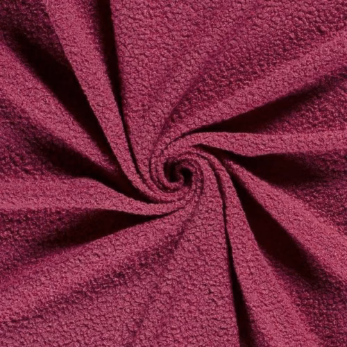 Fuchsia bouclé stof